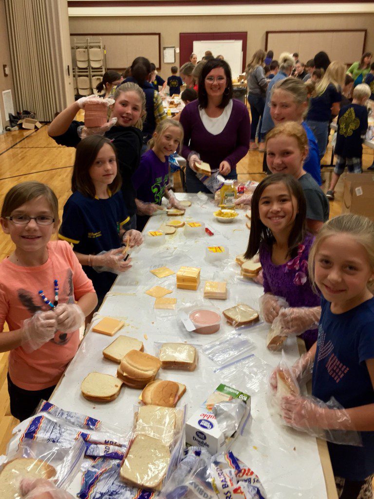 Sandwich makers Kaitlyn Yost, Alyssa Jensen, Kylee Kochenower, Grace Frodsham, Delsa Andersen, Mattie Kochenower, Audrey Elggren, Tiara Pimentel, and Claire Frodsham