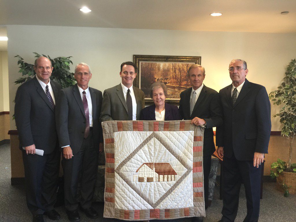 Pictured (Left to right): Karl M Tilleman, Area Authority; Kris Dearden, Burleson Stake President; Steve Beauchamp, 1st Councelor; Sister Priscilla Baird; Elder Bradley D. Foster, of the Seventy; and Jodie Barrus, 2nd Counselor.